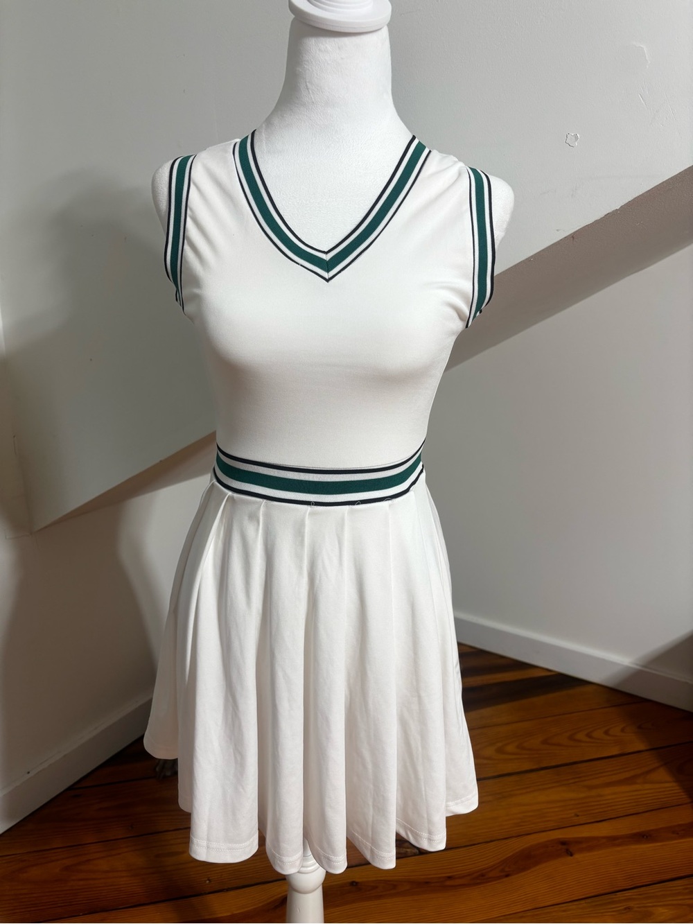 White Sleeveless Tennis Dress with Green Stripe Trim
